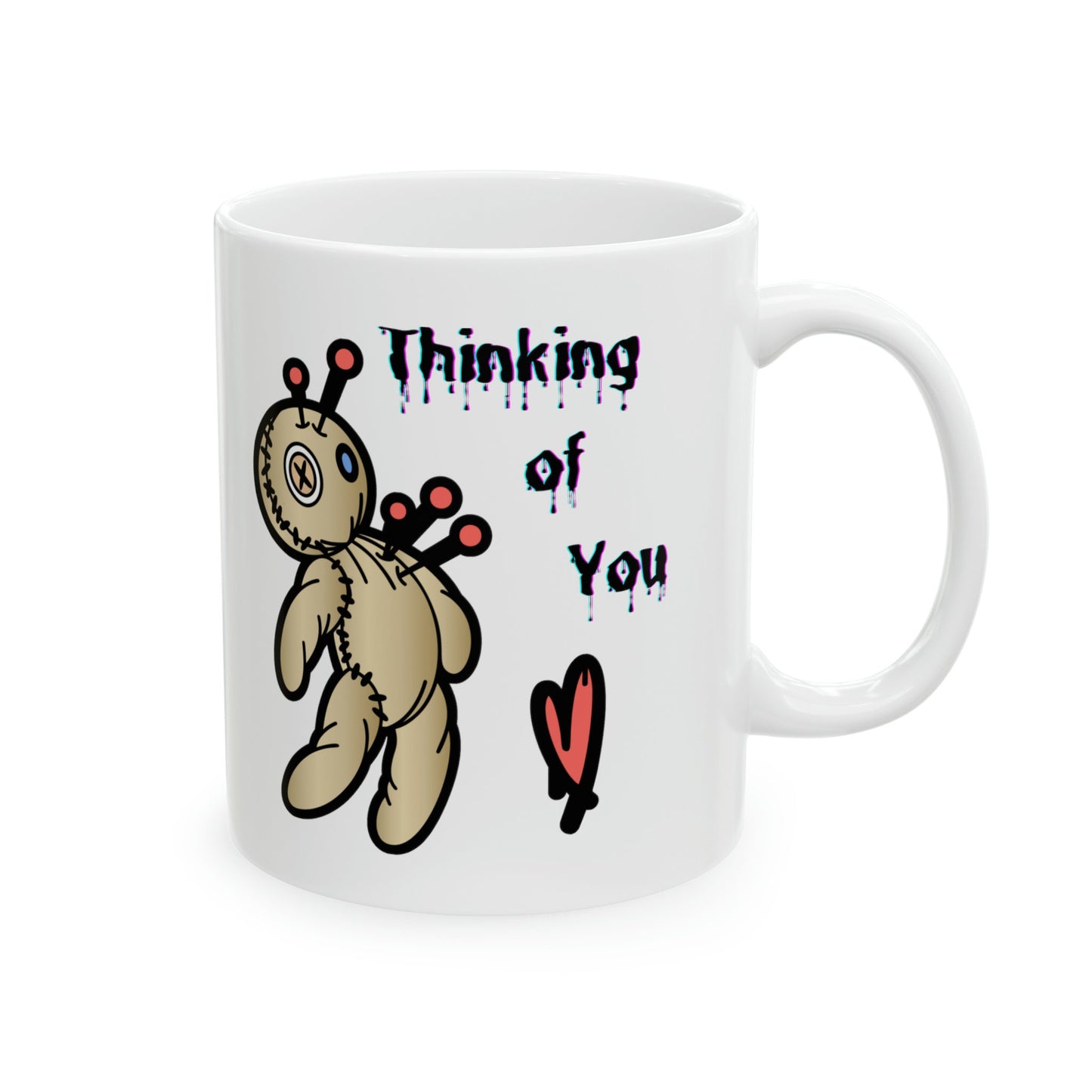 white ceramic coffee mug with a Voo doo doll being poked with pins. The words Thinking of you are written in a scary dripping Halloween Font. A red heart is under the wording. Check out my shop at www.scorpiontees.etsy.com