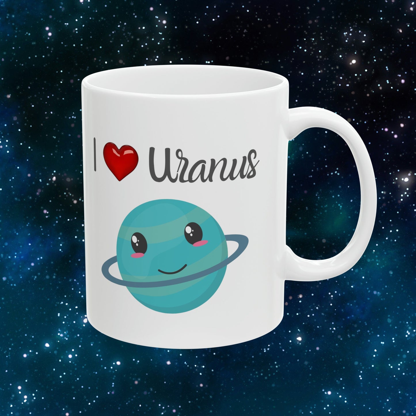 White Ceramic Mug with words in Script style black font that say, I Love Uranus.  Love as a red heart symbol.  Beneath you find a Cute graphic of the Planet Uranus with an adorable face.  Check out the shop for more items at www.scorpiontees.etsy.com