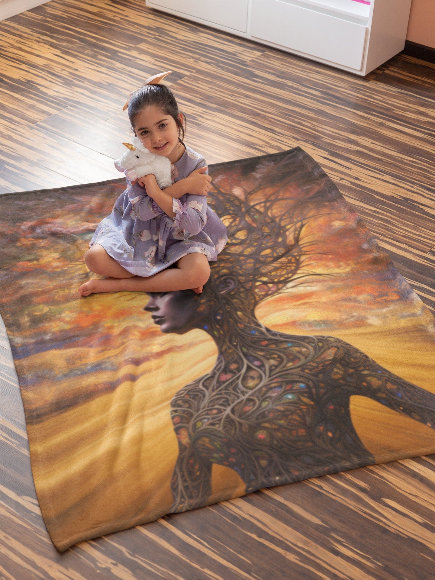 Beautiful, Warm and Cozy Mother Earth Blanket.  Available   Features a beautiful brown skin woman and her body is made of tree branches.  There is a golden sky at sunset behind her.  www.scorpiontees.etsy.com