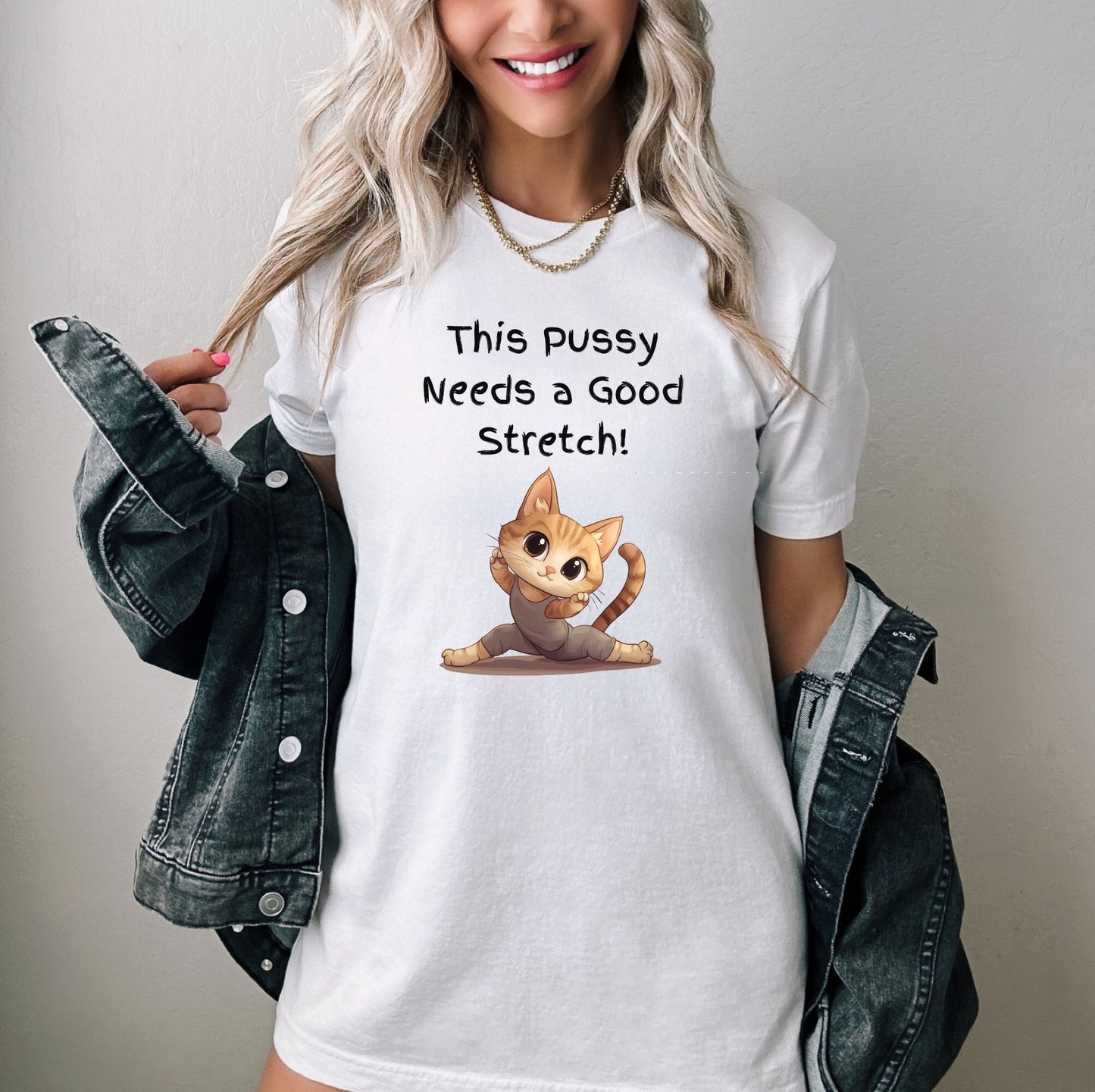 Bella and Canvas 3001 T Shirt with the Words This pussy needs a good stretch in finger paint font. Below the words there is a Cartoon cat stretching doing a split. Hilarious sexy shirt while stylish and comfortable