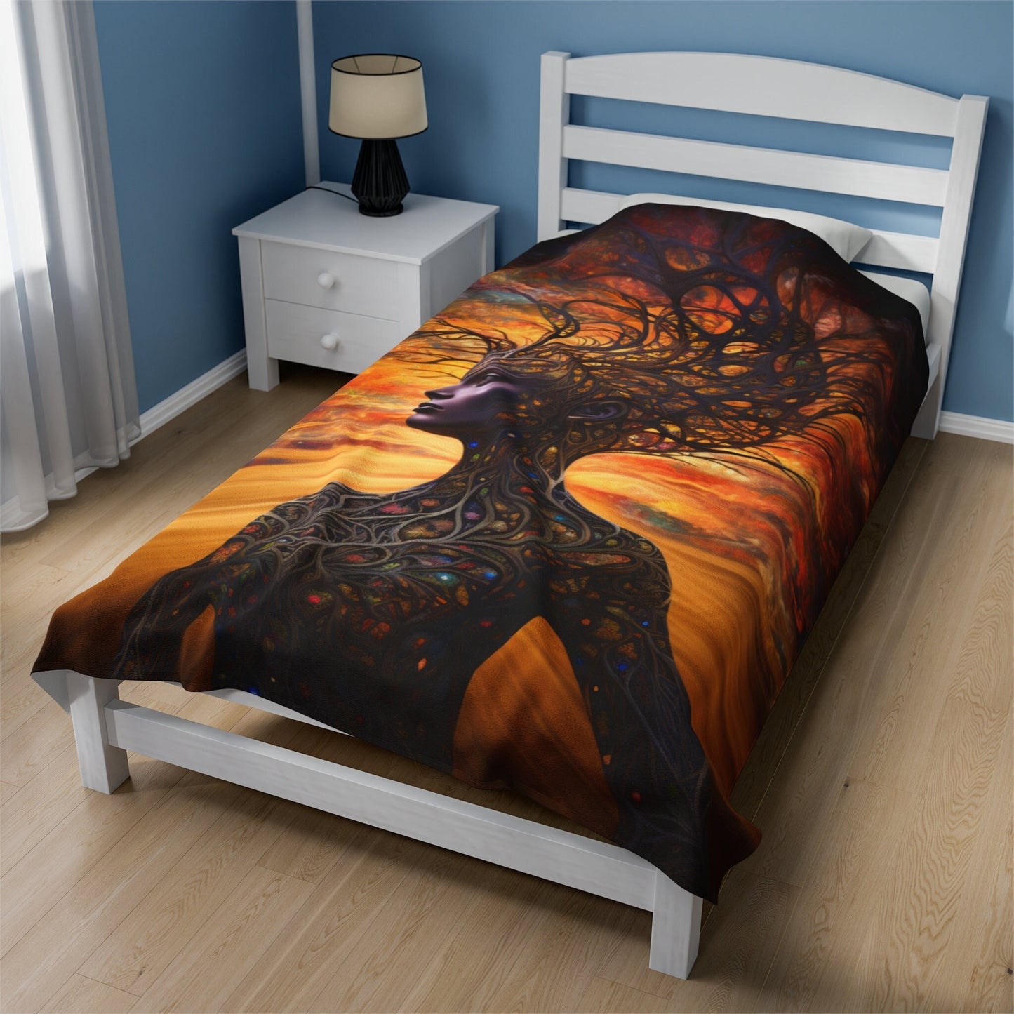 Beautiful, Warm and Cozy Mother Earth Blanket.  Available   Features a beautiful brown skin woman and her body is made of tree branches.  There is a golden sky at sunset behind her.  www.scorpiontees.etsy.com