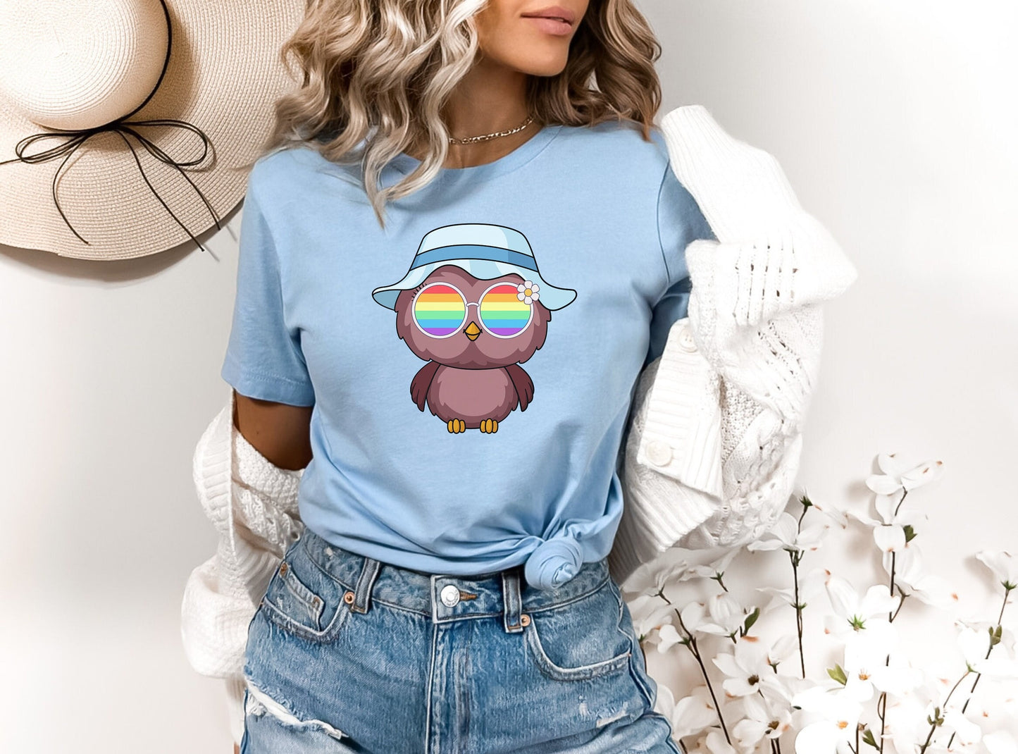 Super cute owl with rainbow glasses shirt blue hat, Rainbow glasses on an adorable owl, precious owl showing off pride. Beautiful pride owl