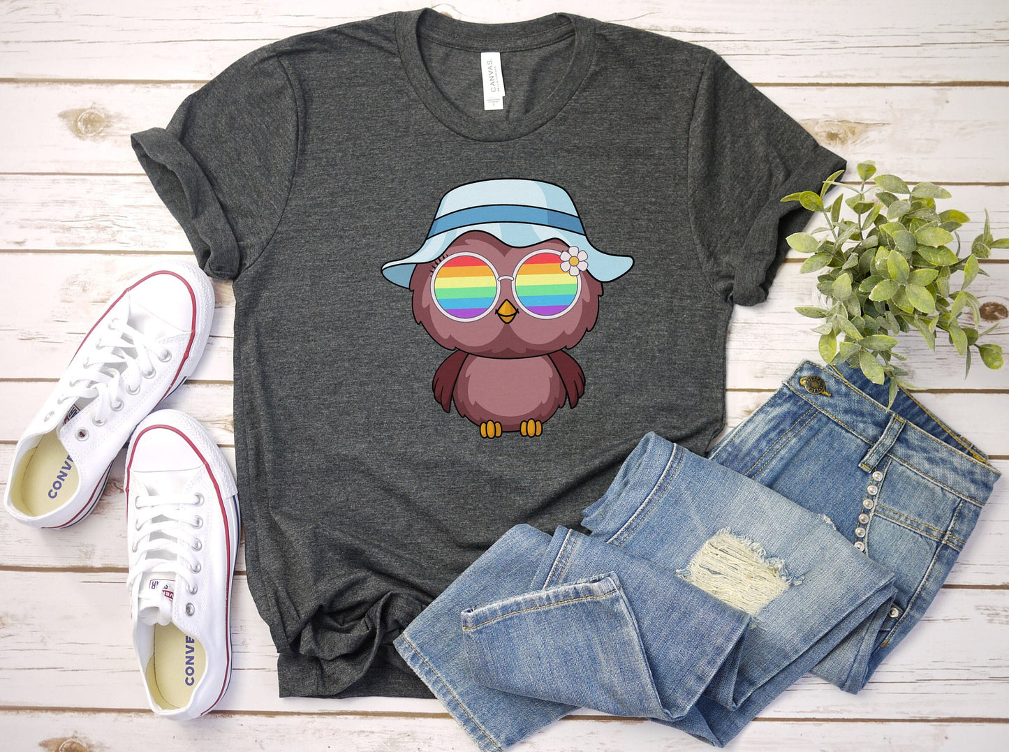 Super cute owl with rainbow glasses shirt blue hat, Rainbow glasses on an adorable owl, precious owl showing off pride. Beautiful pride owl