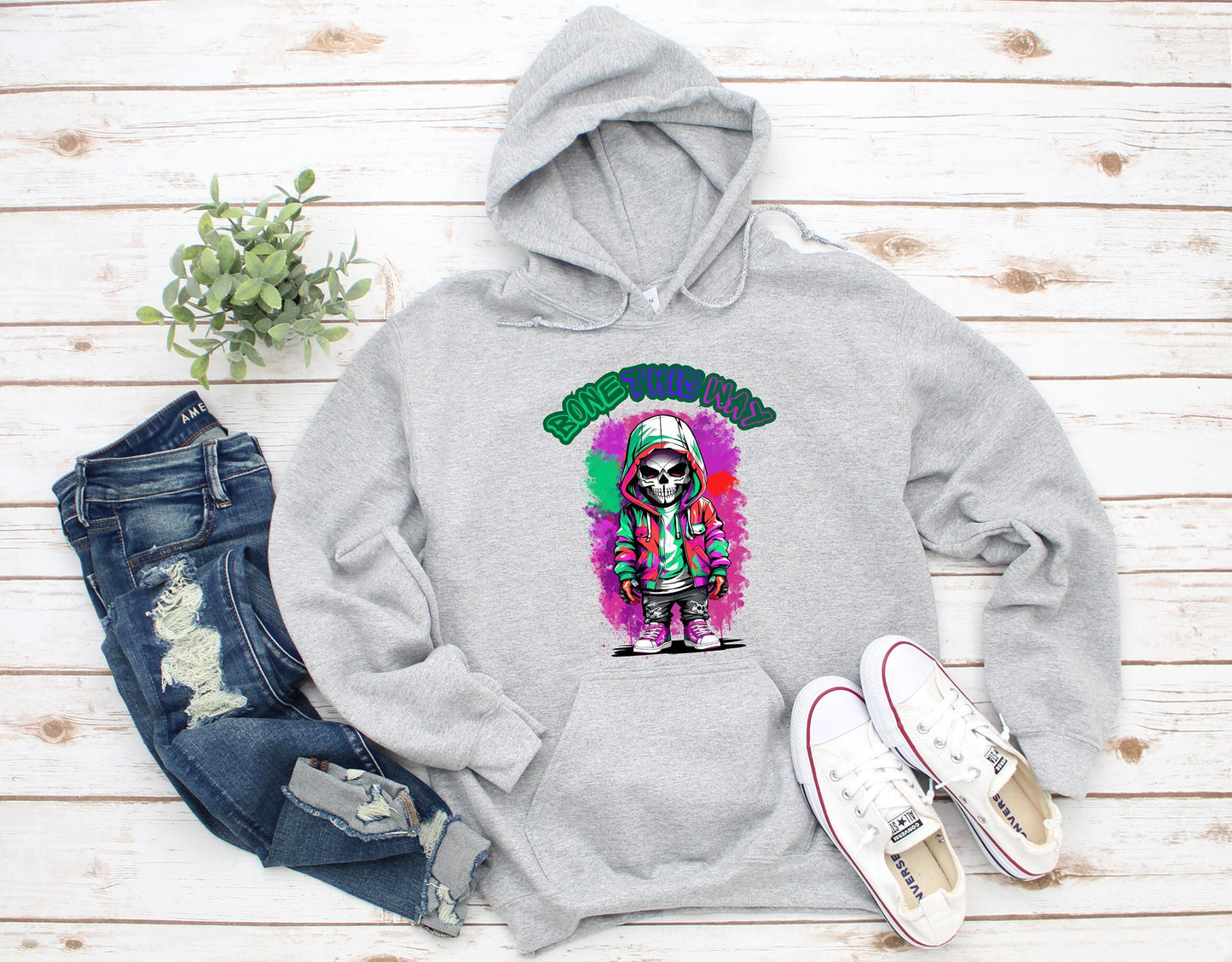 Bone This Way Skeleton Hoodie by Scorpion Tees and More.  Cute colorful Skeleton with hoodie wearing hip hop style clothing.  This Hoodie will go great with any outfit.  Beautiful design and stylish as well as very warm and comfortable.