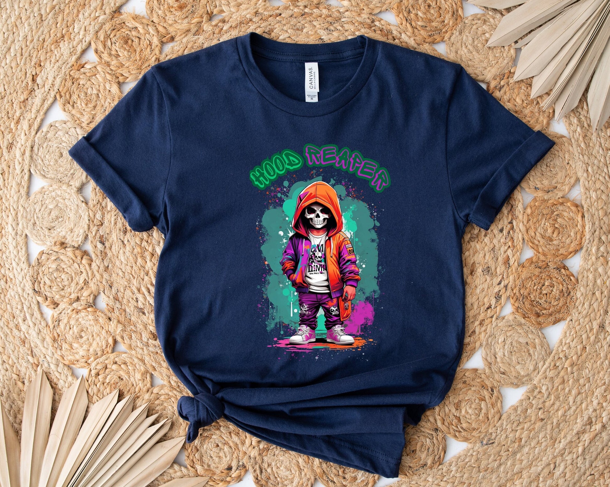 hood Reaper Skeleton T shirt by Scorpion Tees and More.  Cute colorful skeleton t shirt.  Skeleton with hoodie wearing hip hop style clothing.  T shirt would go great with any outfit.  Beautiful design and stylish as well as very comfortable.