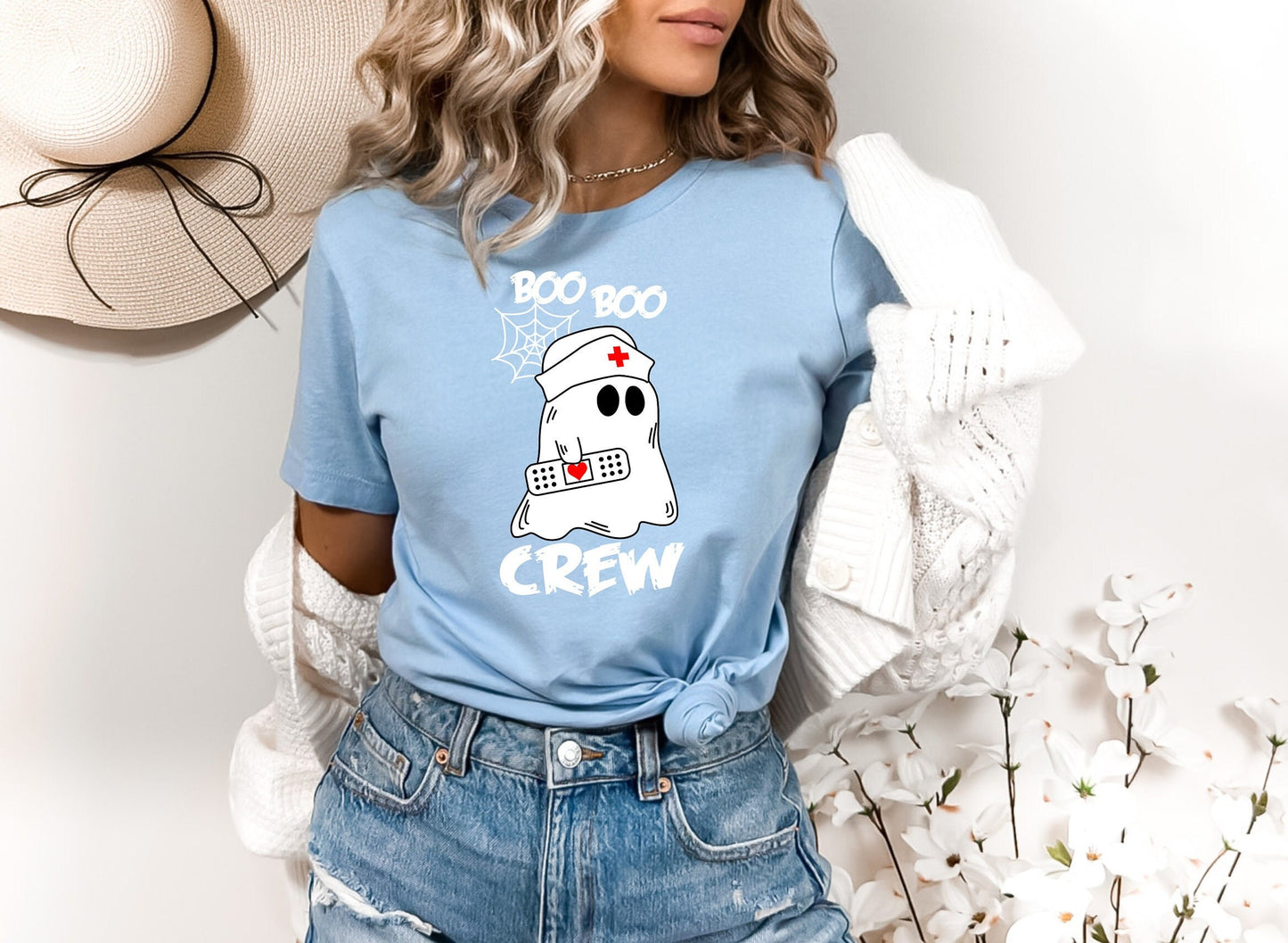 Boo Boo Crew Halloween Ghost nursing shirt.  Cute and comfortable T shirt with and adorable Ghost holding a band aid. This stylish shirt will go well with anything. Makes a perfect gift for nurses.
www.scorpiontees.etsy.com