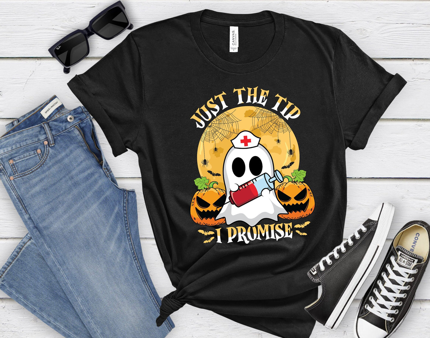 Just the Tip I promise Halloween Nursing Ghost T shirt.  This stylish Tee has a cool design of a Ghost with a nurse hat holding a syringe next to pumpkins spiders and bats. Makes a perfect gift for Halloween and for nurses.
www.scorpiontees.etsy.com