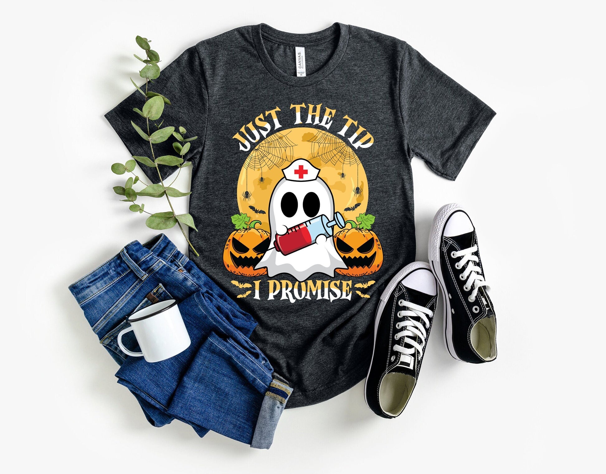 Just the Tip I promise Halloween Nursing Ghost T shirt.  This stylish Tee has a cool design of a Ghost with a nurse hat holding a syringe next to pumpkins spiders and bats. Makes a perfect gift for Halloween and for nurses.
www.scorpiontees.etsy.com