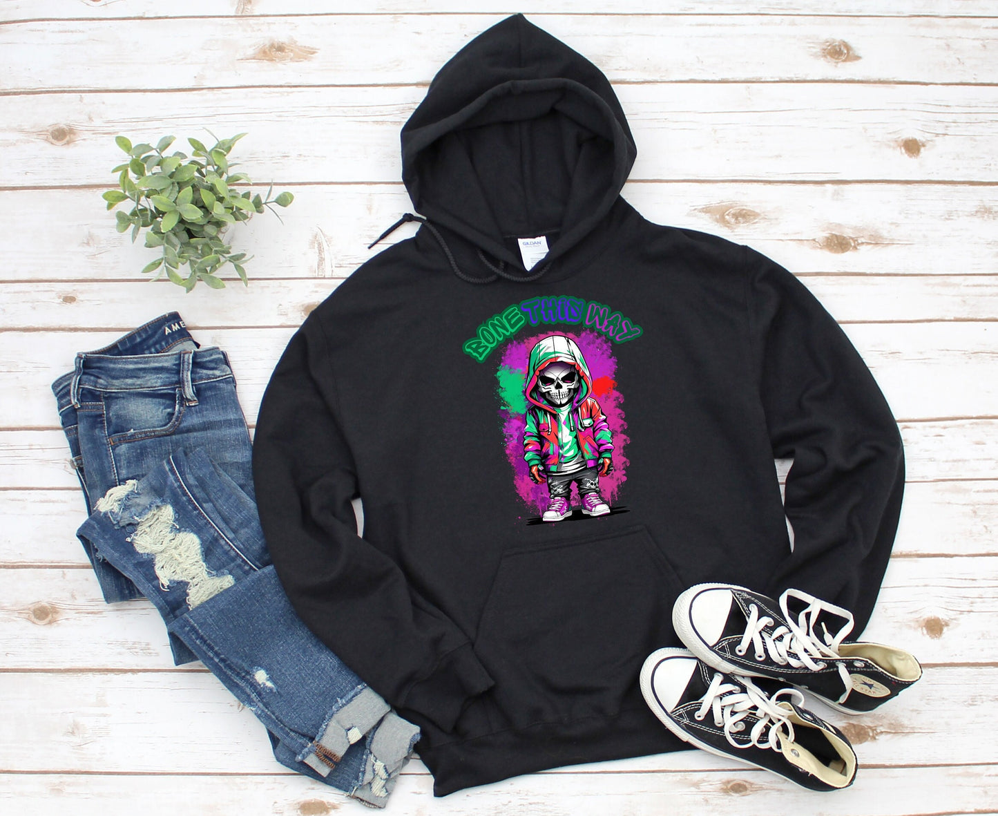 Bone This Way Skeleton Hoodie by Scorpion Tees and More.  Cute colorful Skeleton with hoodie wearing hip hop style clothing.  This Hoodie will go great with any outfit.  Beautiful design and stylish as well as very warm and comfortable.