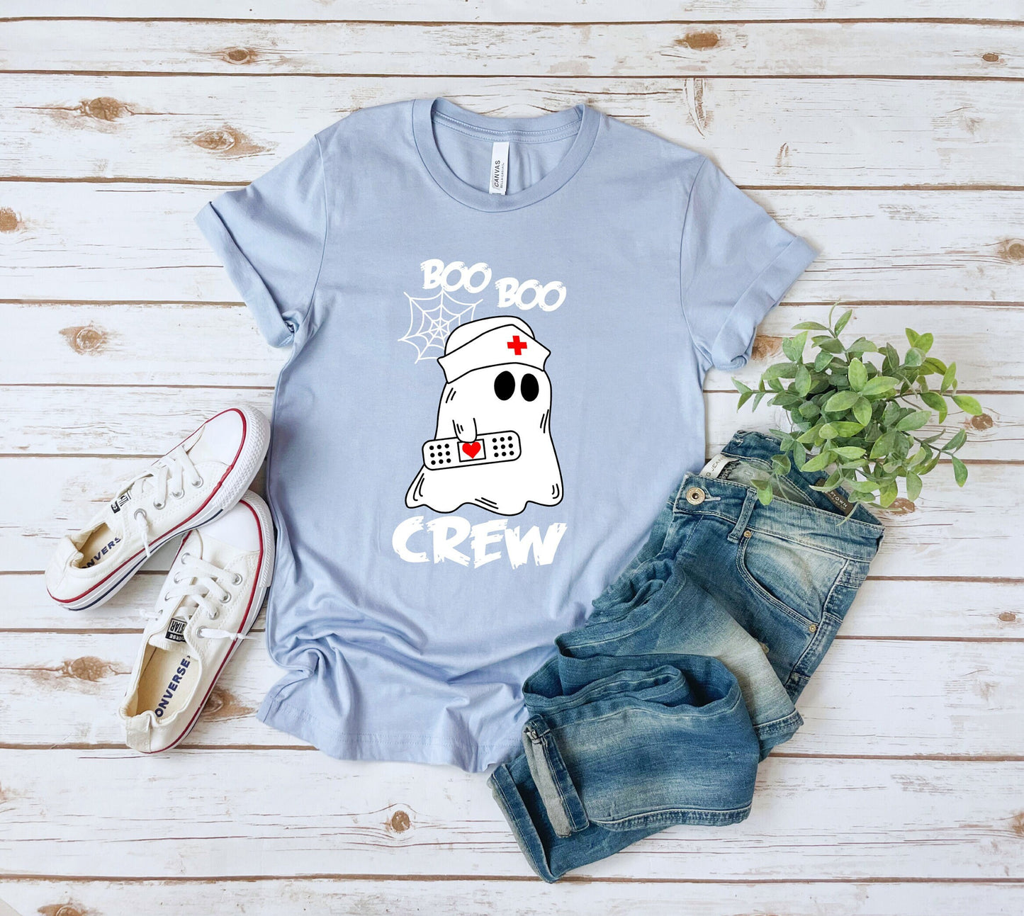 Boo Boo Crew Halloween Ghost nursing shirt.  Cute and comfortable T shirt with and adorable Ghost holding a band aid. This stylish shirt will go well with anything. Makes a perfect gift for nurses.
www.scorpiontees.etsy.com
